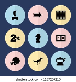 Set of 9 game filled icons such as field, slot machine, casino bet, sport score, chess horse, american football helmet, dinosaur, joystick