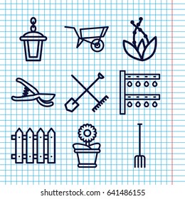 Set of 9 garden outline icons such as shovel and rake, wheel barrow, pitchfork, garden tools, irrigation system, flower pot, fence, street lamp