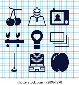 Set of 9 green filled and outline icons such as peach, cherry, hoe, bulb heart, intercom, plant, business center, burst
