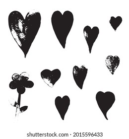 set of 9 grunge hearts. Drawn by hand. Vector illustration. Isolated.