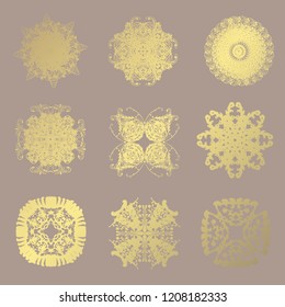 Set of 9 hand drawn decorative golden snowflakes, design elements. Christmas and New Year background. Winter theme