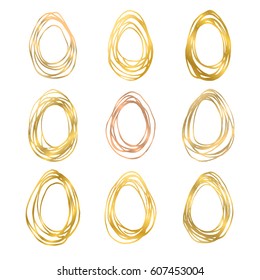 Set of 9 handdrawn doodle eggs. Hand painted gold shapes isolated on white background. Design elements for Easter decoration