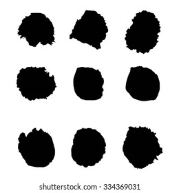 Set of 9 hand-drawn ink blots. Vector illustration. Isolated.