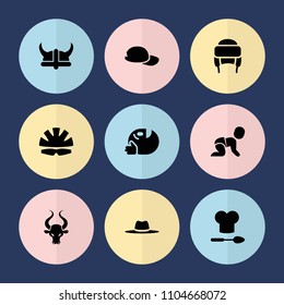 Set of 9 head filled icons such as winter hat, hat, chef hat and spoon, helmet, baseball cap, bull, crawling baby