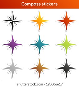 Set of 9 isolated compass stickers in different colors