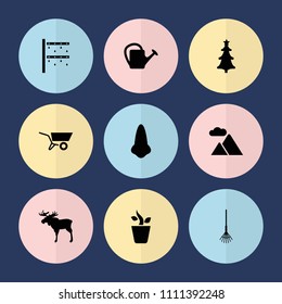 Set of 9 nature filled icons such as moose, nose, rake, watering can, christmas tree, mountain, wheel barrow, irrigation system