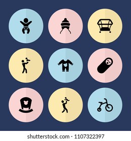 Set of 9 newborn filled icons such as child bicycle, baby cap, playpen, newborn child