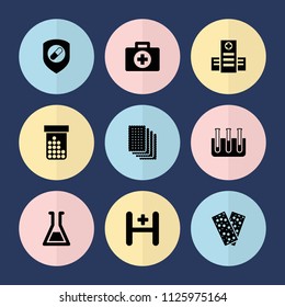 Set of 9 pharmacy filled icons such as hospital, bandage, test tube, first aid, bottle pills