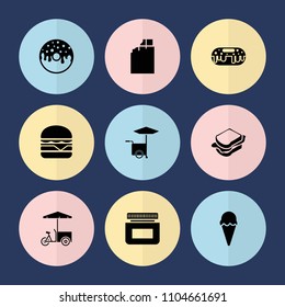 Set of 9 snack filled icons such as chocolate, donut, sandwich, cheeseburger, fast food cart, ice cream