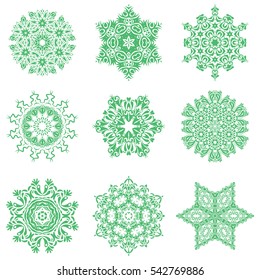 Set of 9 snowflakes, snowfall in green colors on a white background. Stock vector illustration falling snow.