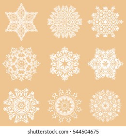 Set of 9 snowflakes, snowfall on a beige background. Stock vector illustration falling snow.