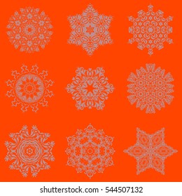 Set of 9 snowflakes. Vector christmas abstract orange background with falling snowflakes.