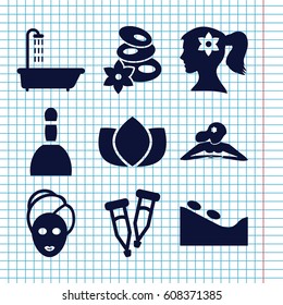 Set of 9 spa filled icons such as shower, spa bag, woman face with flower in hair, lotus