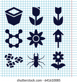 Set of 9 spring filled icons such as beetle, pot for plants, flower, nesting house, spring rotate