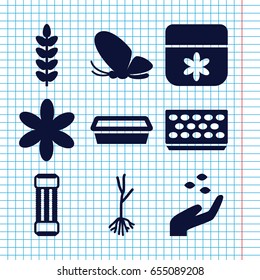 Set of 9 spring filled icons such as hand with seeds, butterfly, flower, pot for plants, sprout, expander sport
