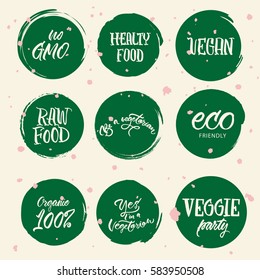 Set of 9 stickers: "no GMO", "Organic 100%", raw, healthy food, vegan, veggie party. Hand drawn lettering/logo for vegetarian shop or bar. For the prints, carrying case, bags, wrapping paper, logo.