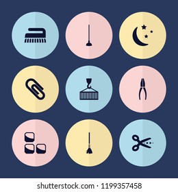 Set of 9 tool filled icons such as scissors, hoe, cargo on hook, moon and stars, brick wall, clean brush, pliers, rake