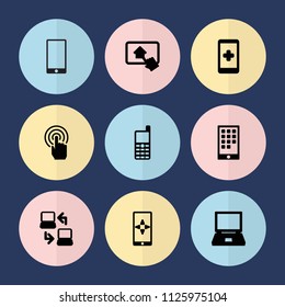 Set of 9 touch filled icons such as laptop, hand on smartphone, home on tablet, calendar on phone, laptop connection, phone, touchscreen