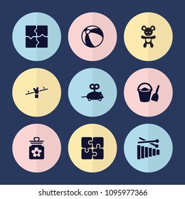 Set of 9 toy filled icons such as beach ball, mouse toy, puzzle, bucket and shovel, baby toy, swing, bear teddy