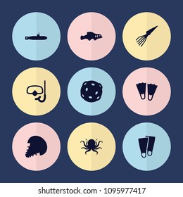 Set of 9 underwater filled icons such as octopus, flippers, snorkel, extinct sea creature, extinct fish