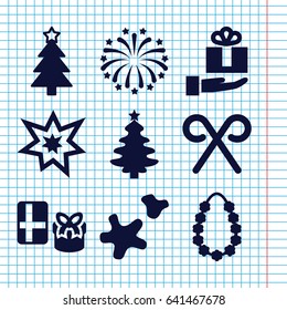 Set of 9 xmas filled icons such as christmas tree, candy cane, fireworks, cookie, garland, gift on hand
