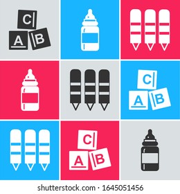 Legen Sie ABC-Blöcke, Baby-Flasche und Wax-Stifte für das Zeichnen von Symbol. Vektorillustration