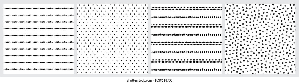 Set of abstract black and white ethnic, geometric and floral patterns. Hand drawn triangles, minimalistic flowers, bead stripes in a modern Scandinavian style.