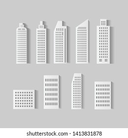 Set of abstract buildings made of paper White isolated on gray background