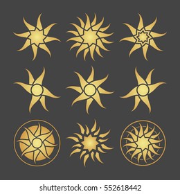 Set of abstract gold sun icons. Stars.