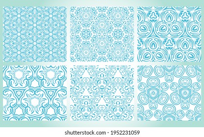 Set of abstract hand drawn doodle thin line swirl seamless patterns. Curly ornamental symmetric background.