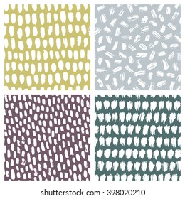Set of abstract hand drawn seamless patterns, brush strokes textures