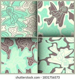 Un conjunto abstracto de cuatro telones de fondo sin costuras con patrones creativos que son flores similares.