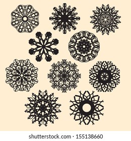 A set of abstract lace patterns in the form of snowflakes. Can be used for decorations, ornaments greeting cards, greeting sets
