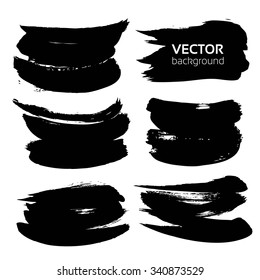 Set of abstract long thick black smears textured isolated on a white background