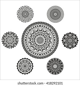 Set of abstract monochrome vector mandalas.