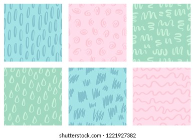 Set of abstract seamless pastel colored patterns. Hand drawn doodle elements. Scandinavian design style. Vector illustration for textile, backgrounds etc