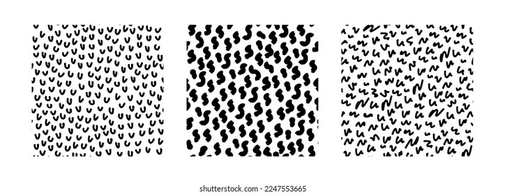 Set of abstract seamless patterns with textures. Black and white simple backgrounds with scribbles. Vector hand-drawn illustration. Perfect for decorations, wallpaper, wrapping paper, fabric, print.