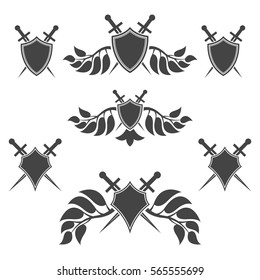 Set of abstract shield and sword icon