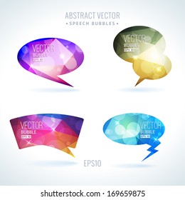 Set of abstract speech balloons or talk bubbles of crystal glass pattern with sparks and bokeh. Good as label template for business advertising