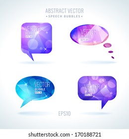 Set of abstract speech balloons or talk bubbles of crystal glass pattern with sparks and bokeh. Good as label template for business advertising