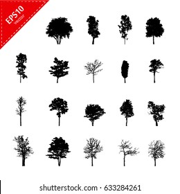 Set of abstract trees silhouettes on white background with a realistic,black tree