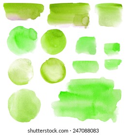 Set of abstract watercolor spots on a white background. Bright juicy inonki for text painted in watercolor. Green. Vector design elements