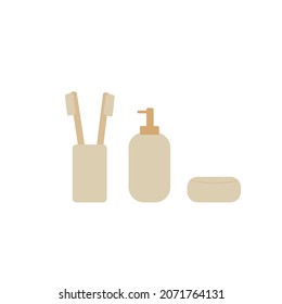Conjunto de accesorios para el baño. Vidrio con dos cepillos de dientes, dispensador de jabón líquido, tarro de crema