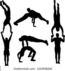 Set of acrobats in different stances silhouette on a white background