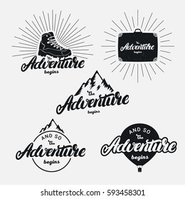 Set of the adventure begins hand written lettering phrase. Motivational quote calligraphy with mountains, trekking boot, suitcase and balloon. Isolated on background. Vector illustration.