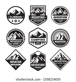 Set of adventure outdoor concept badges, camping emblem, mountain climbing logo in flat style. Exploration sticker symbol. Creative vector illustration. Graphic design in black and white colors.  