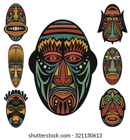 Set of African Ethnic Tribal masks on white background. . Flat icons. Ritual symbols.