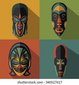 Set of African Ethnic Tribal masks on color background. Flat icons. Ritual symbols.