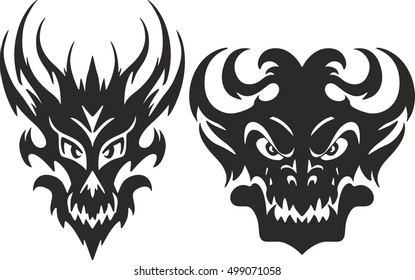 Set of aggressive symmetrical tribal monster head tattoo sketches
