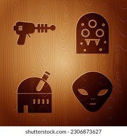 Coloca Alien, Ray gun, observatorio astronómico y Alien en el fondo de madera. Vector